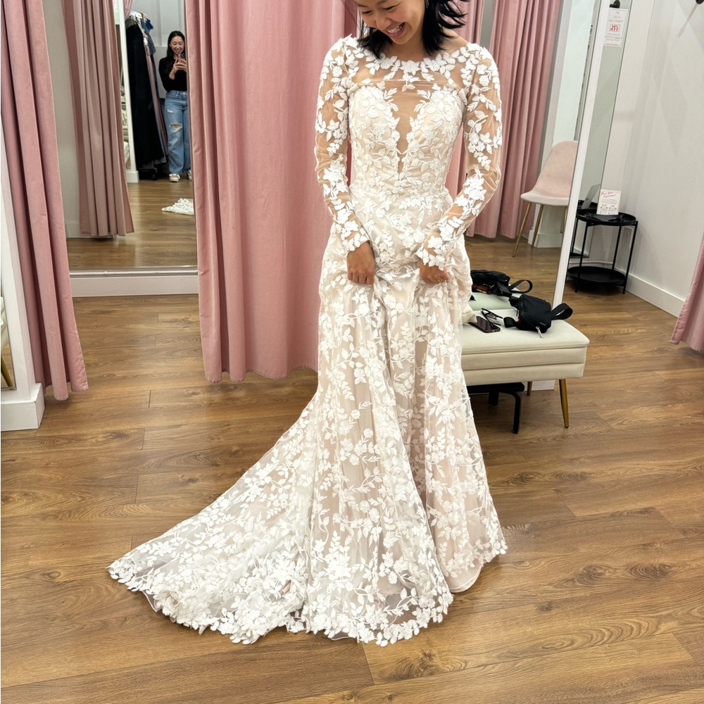 Lillian West 66188
Cotton lace gown with open back and detachable long sleeves